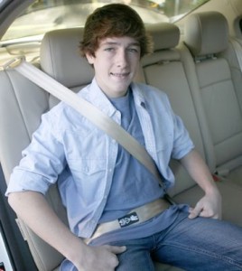 Teenager in a seat belt